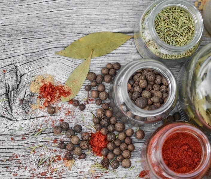 Pots of herbs on a table