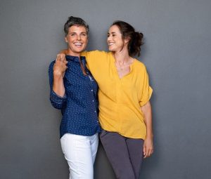 Mature friends women laughing together