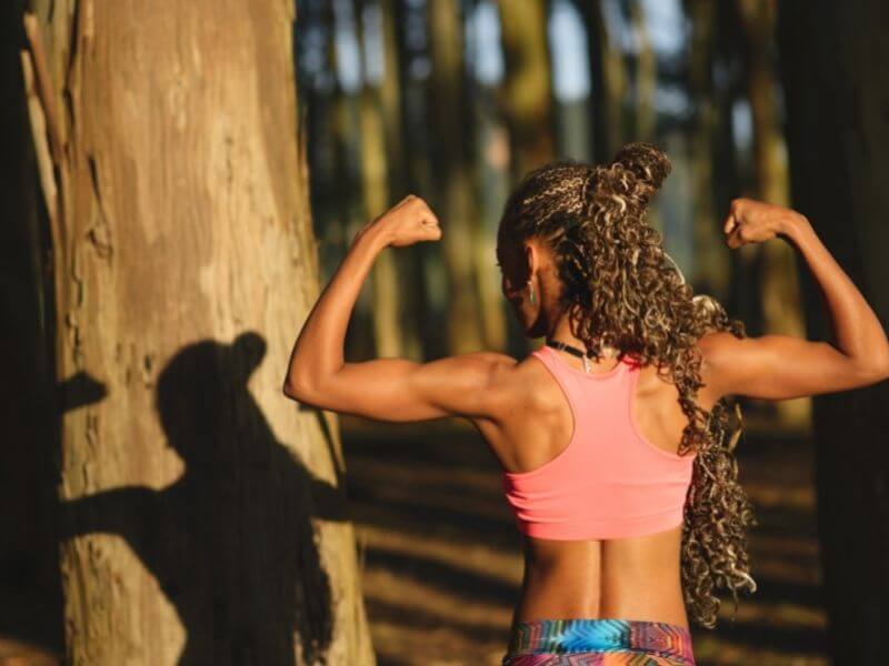 Woman flexing her biceps