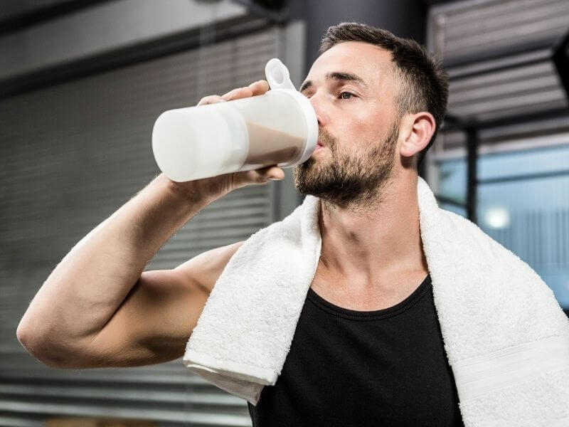 Man drinking protein shake after working out