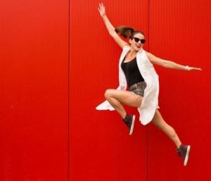 Woman jumping into the air