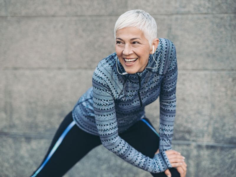 Older woman doing stretches