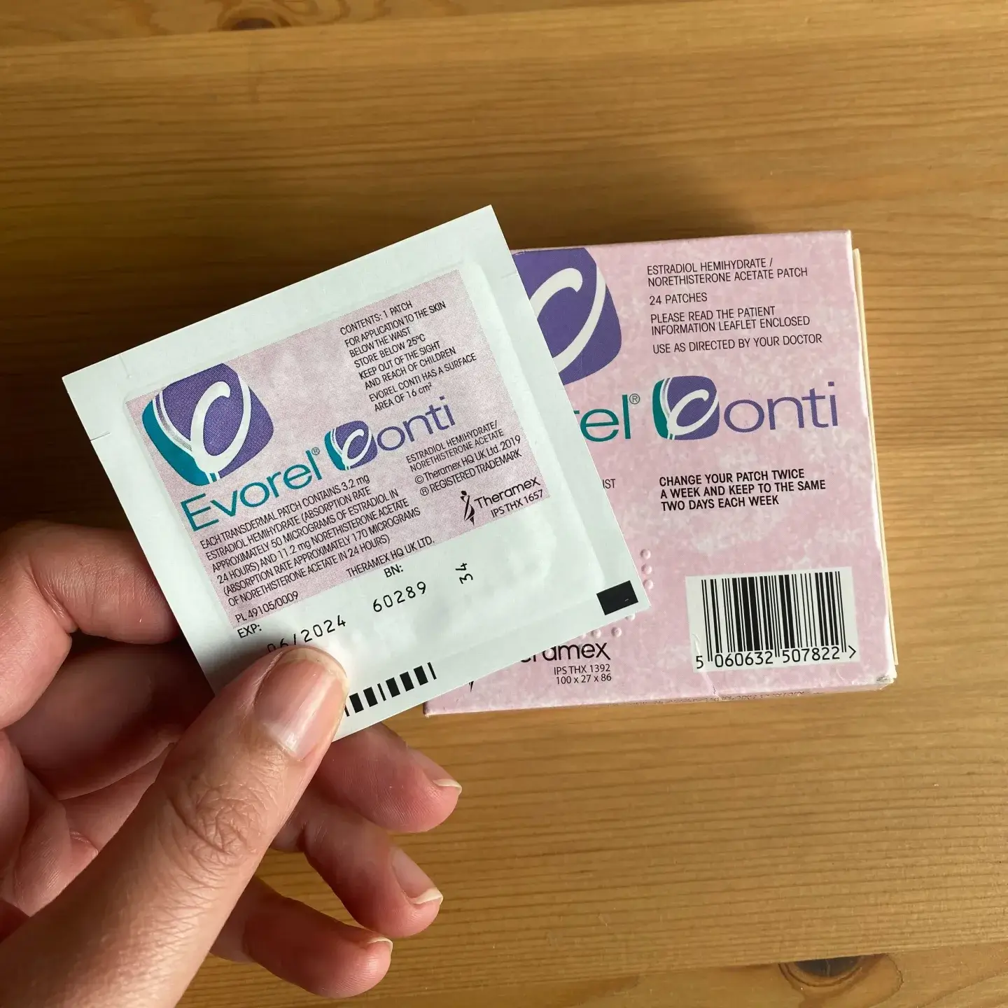Louise holding a HRT patch